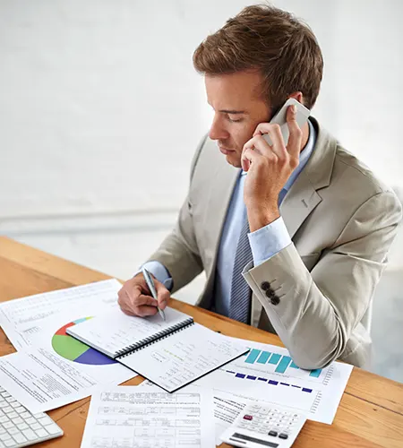 Professional reviewing financial reports